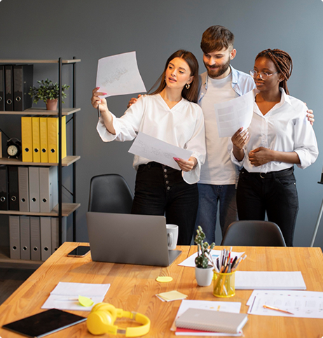 Team reviewing documents together at a desk